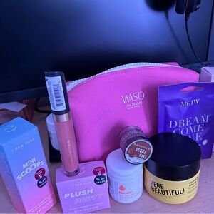 Shiseido Pink cosmetic bag with beauty essentials